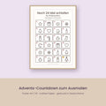 Advents-Countdown-Poster zum Ausmalen im Rahmen an der Wand